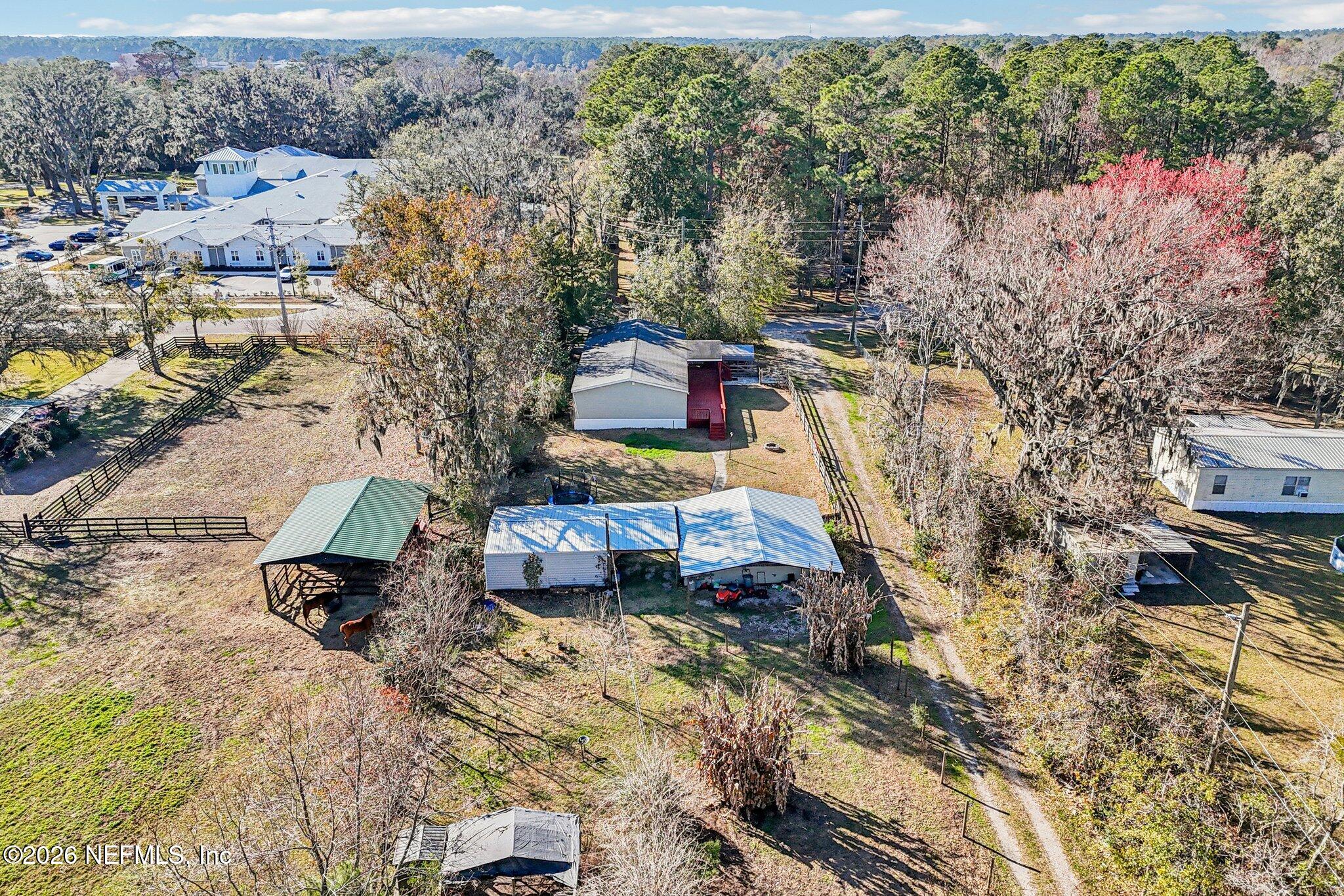 13725 Webb Road Jacksonville, FL 32218 - Photo 54 of 61 a bird view of a house with a yard