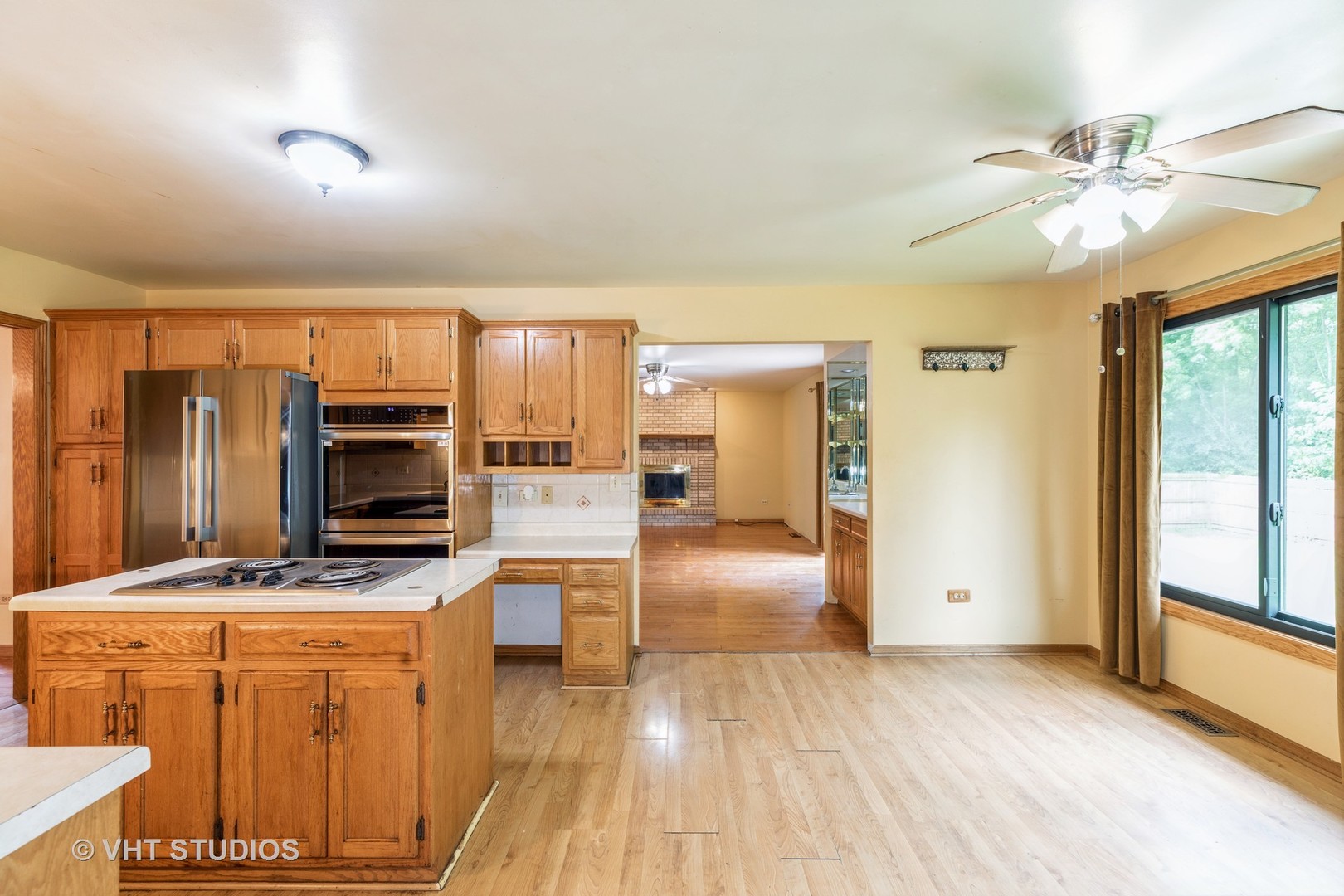 438 Tamarack Street Park Forest, IL 60466 - Photo 8 of 25 a kitchen with stainless steel appliances a stove a refrigerator and cabinets