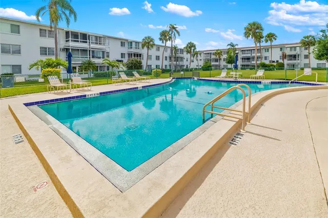 an aerial view of a swimming pool