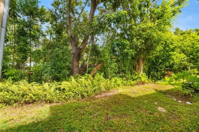 an outdoor space with patio furniture