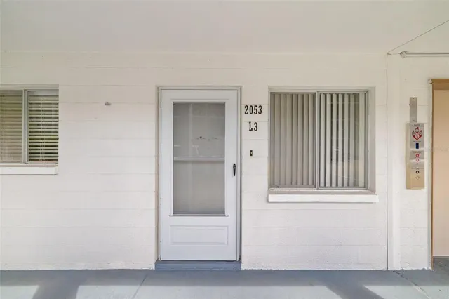 a view of balcony with wooden floor