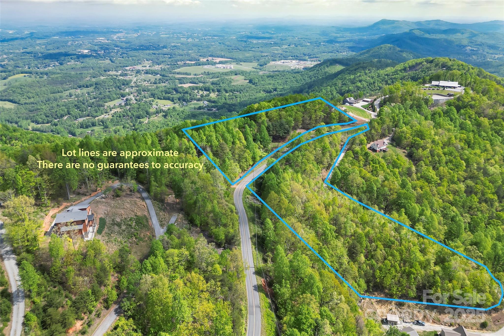 0 Burkemont Road Morganton, NC 28655 - Photo 4 of 15 an aerial view of residential houses with outdoor space and trees