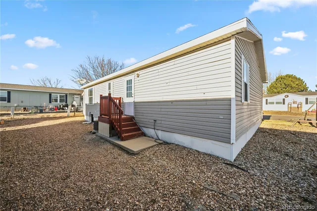 a view of a back yard of the house