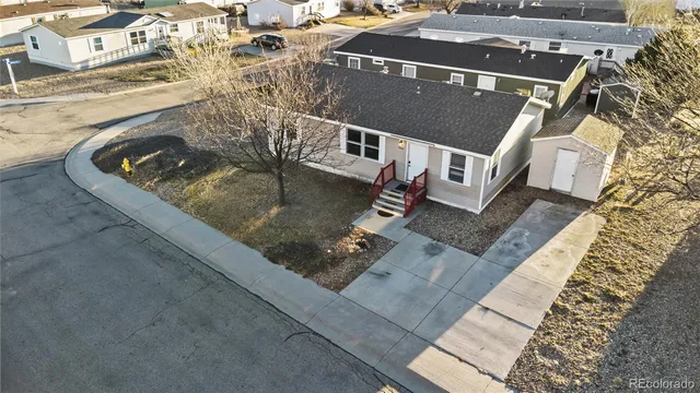 an aerial view of residential building with parking space