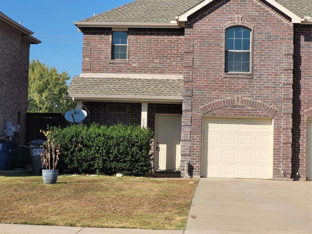 244 Wyndham Meadows Way Wylie, TX 75098 - Photo 1 of 12 a front view of a house with garden