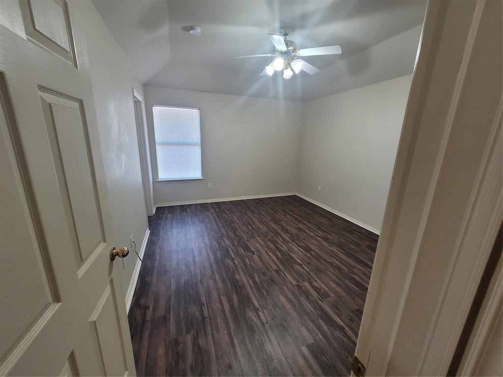 244 Wyndham Meadows Way Wylie, TX 75098 - Photo 8 of 12 a view of a room with wooden floor and staircase