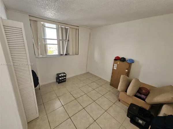a room with a couch and a window