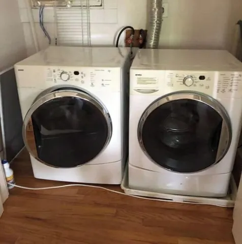 a utility room with dryer and washer
