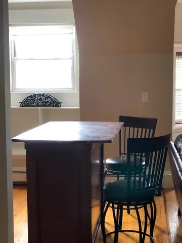 a view of a balcony dining area