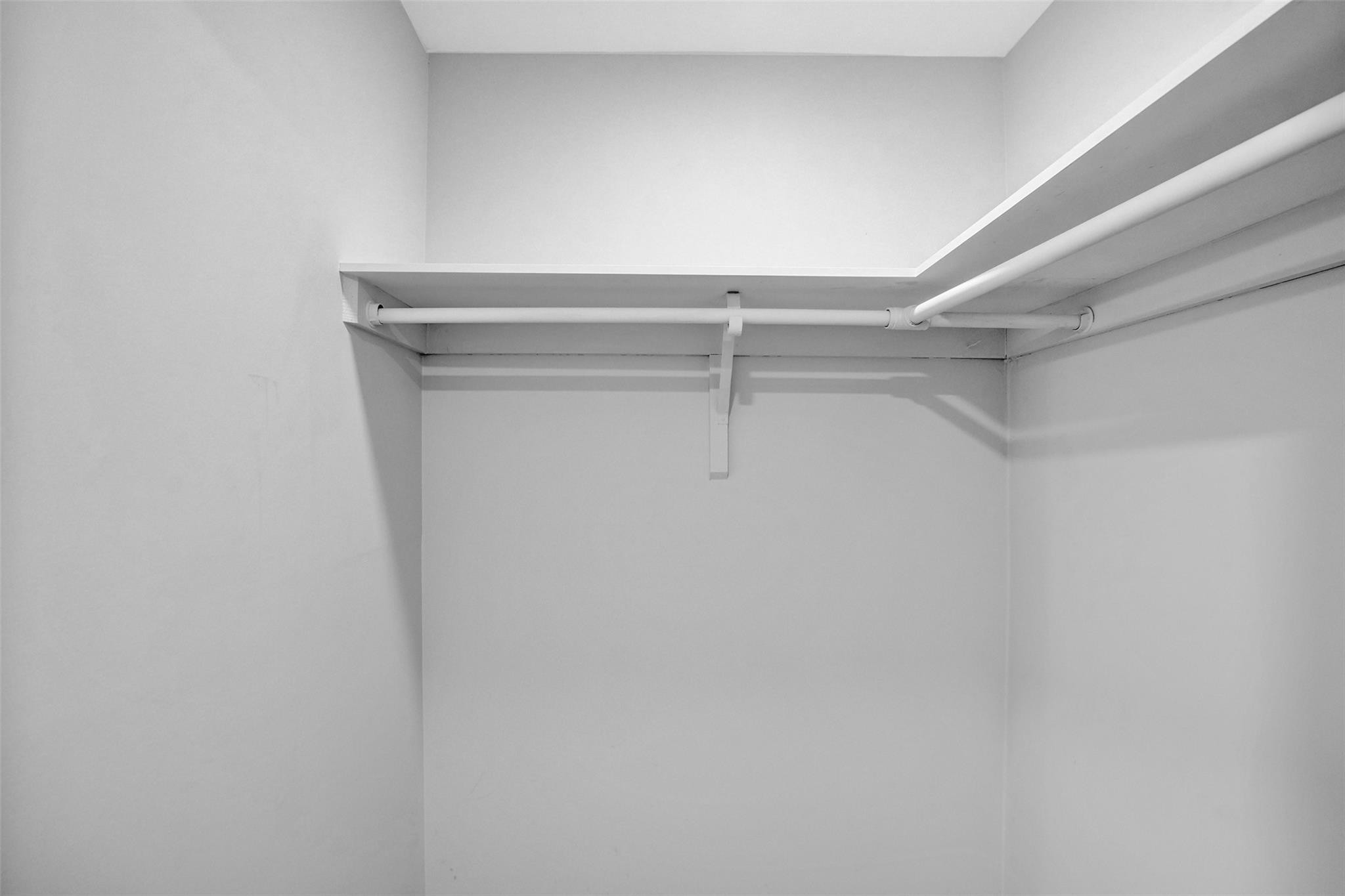 3100 Riverside Drive, Unit 109 Coral Springs, FL 33065 - Photo 13 of 28 a view of a room with racks on the wall