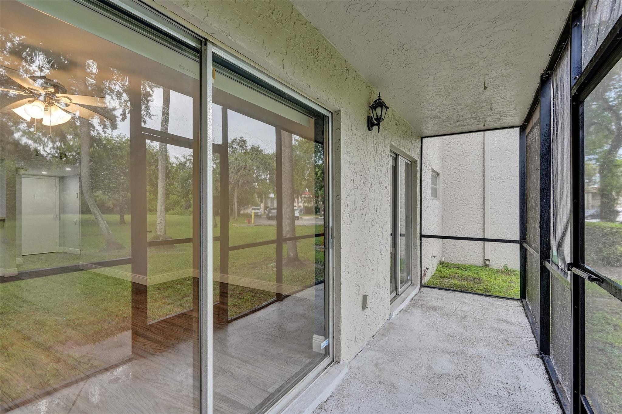 3100 Riverside Drive, Unit 109 Coral Springs, FL 33065 - Photo 18 of 28 a view of a porch