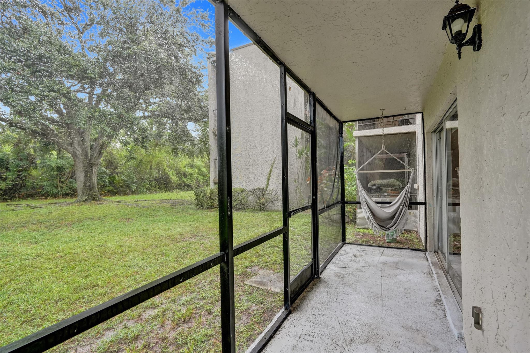 3100 Riverside Drive, Unit 109 Coral Springs, FL 33065 - Photo 19 of 28 a view of a porch