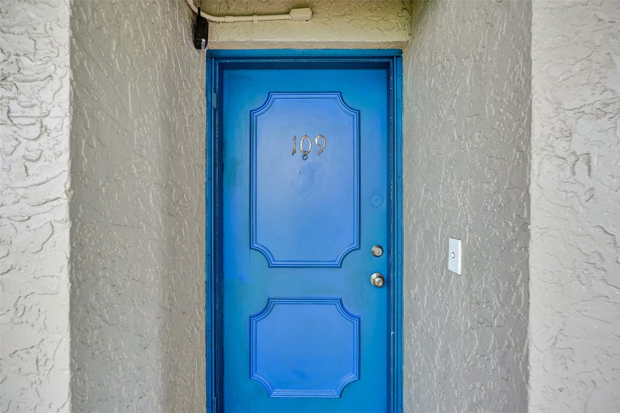3100 Riverside Drive, Unit 109 Coral Springs, FL 33065 - Photo 20 of 28 a view of front door