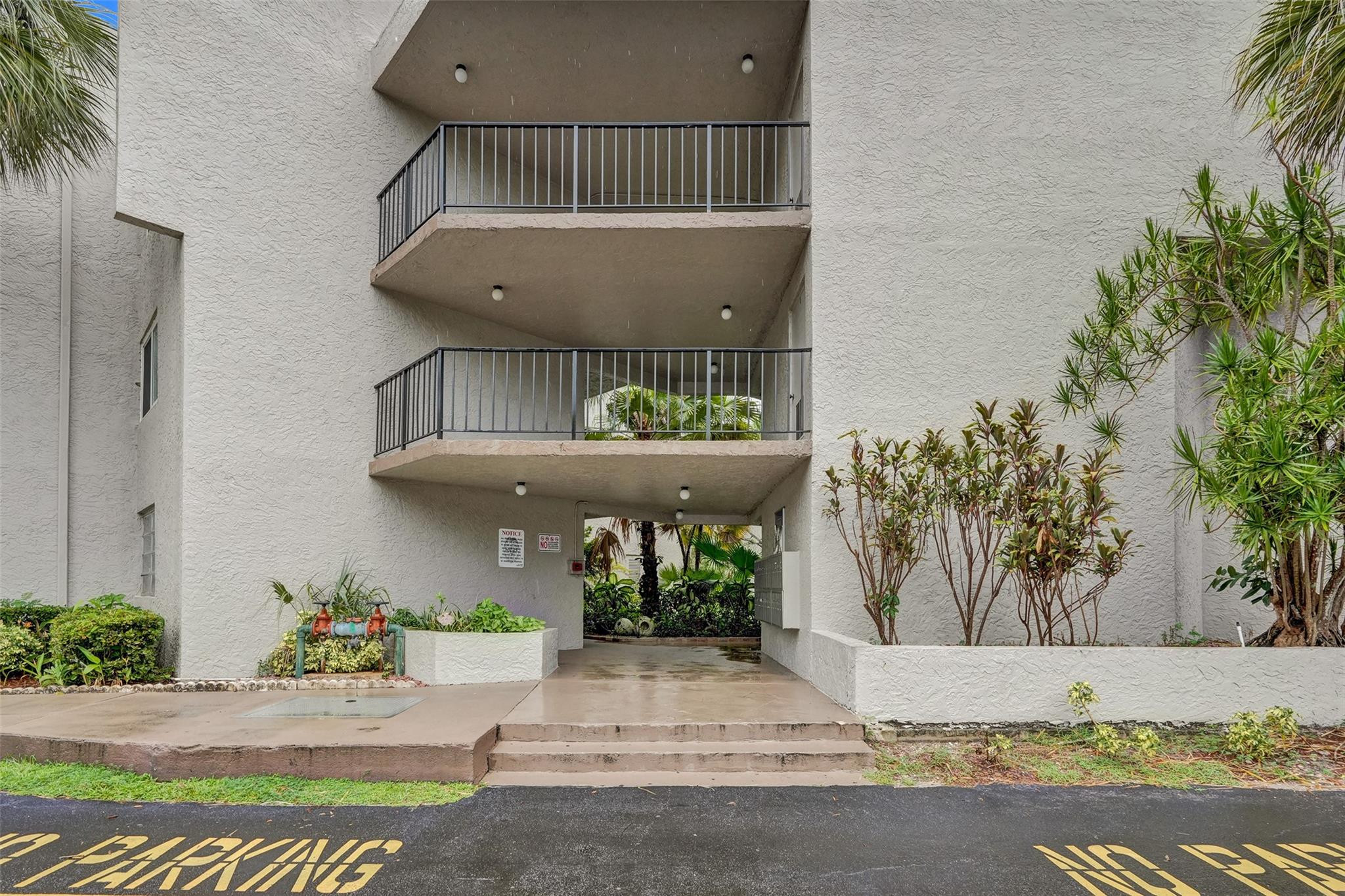 3100 Riverside Drive, Unit 109 Coral Springs, FL 33065 - Photo 22 of 28 a view of a entryway door of the house