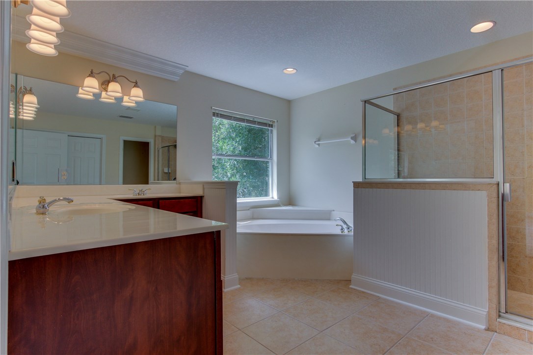 2965 Pinedale Road Fernandina Beach, FL 32034 - Photo 17 of 35 a bathroom with a sink and a mirror