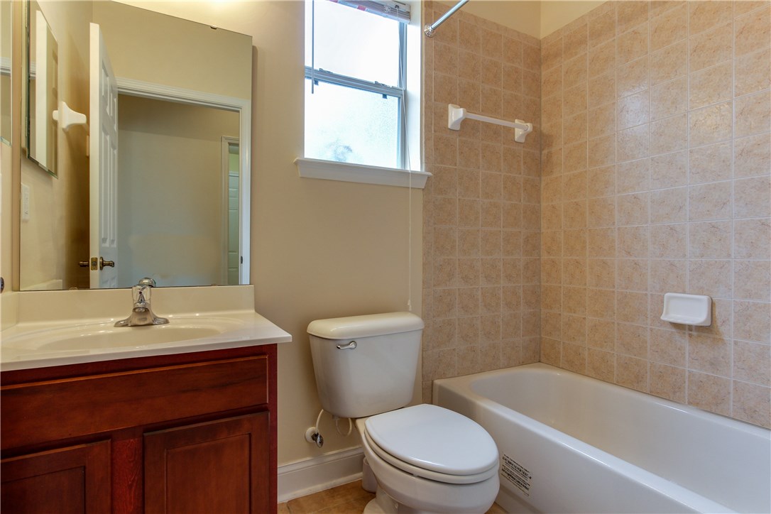2965 Pinedale Road Fernandina Beach, FL 32034 - Photo 23 of 35 a bathroom with a sink a toilet and shower
