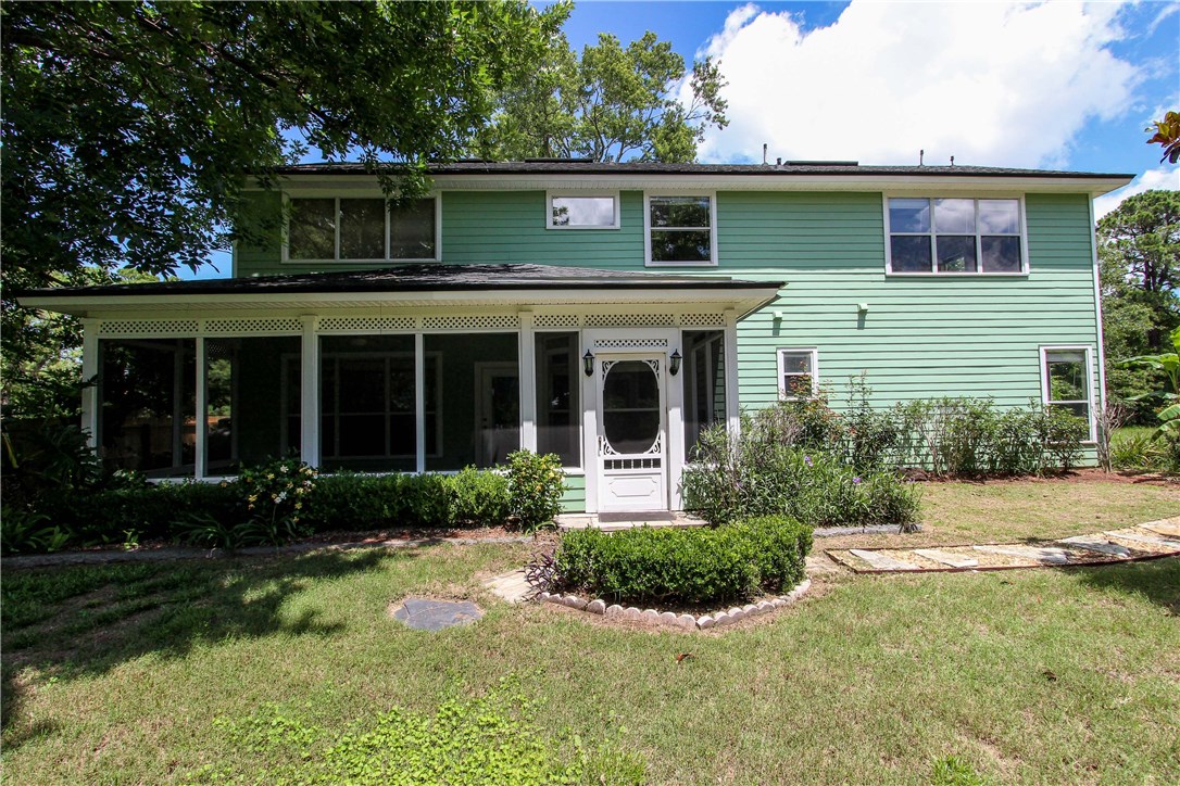 2965 Pinedale Road Fernandina Beach, FL 32034 - Photo 30 of 35 front view of a house with a yard