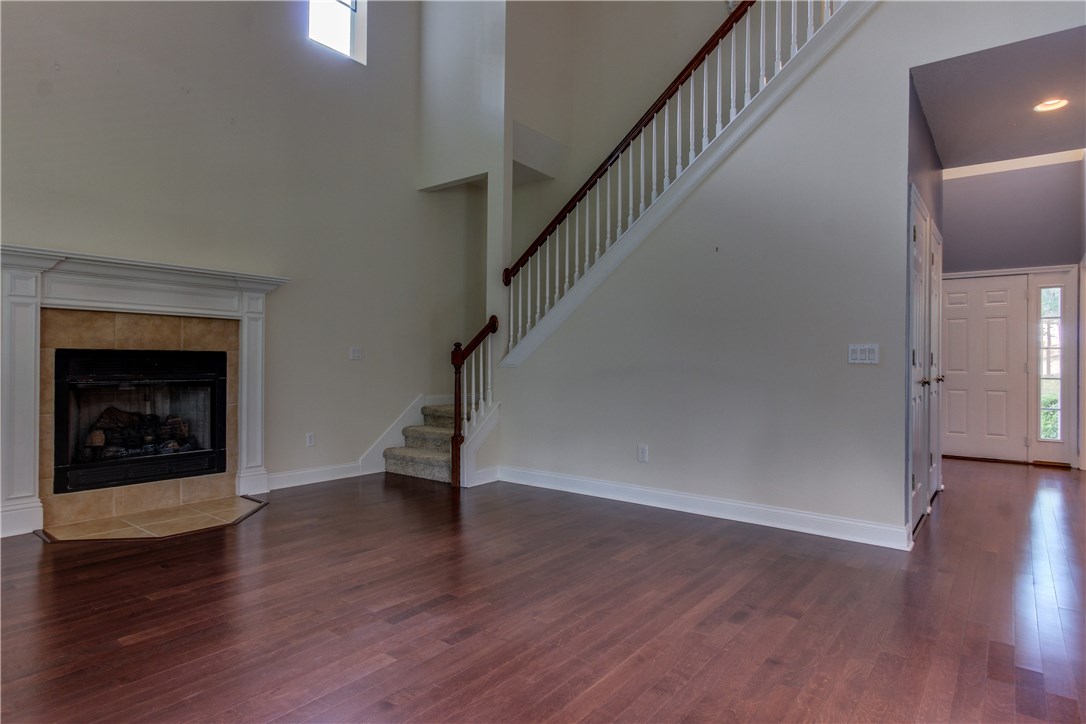 2965 Pinedale Road Fernandina Beach, FL 32034 - Photo 7 of 35 a view of an empty room wooden floor and a fire place