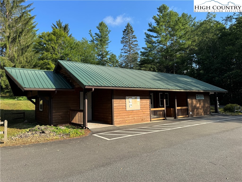 203 Black Pine Road Newland, NC 28657 - Photo 21 of 39 a front view of a house with a yard