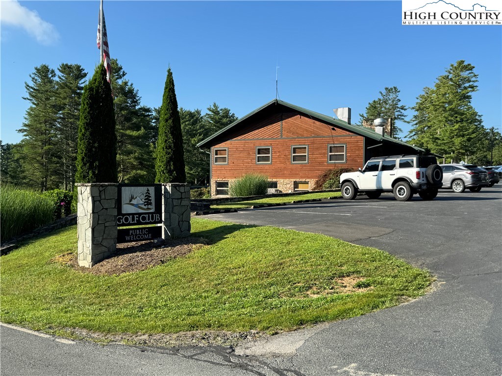 203 Black Pine Road Newland, NC 28657 - Photo 22 of 39 a view of a house with a yard
