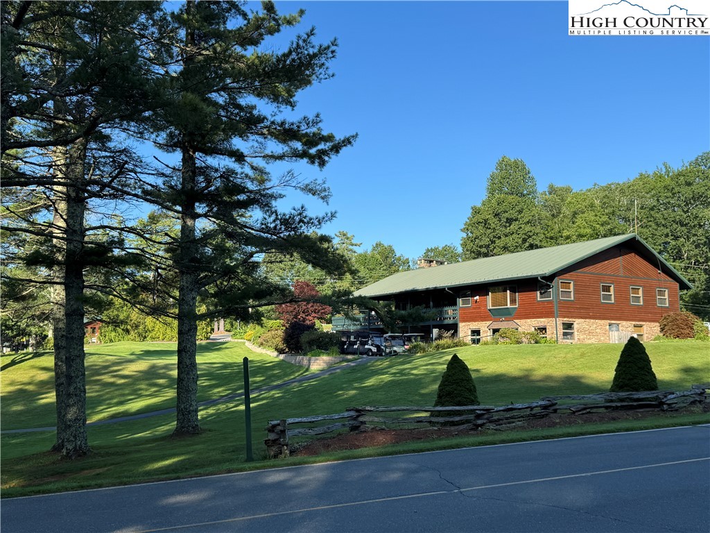 203 Black Pine Road Newland, NC 28657 - Photo 23 of 39 a view of a house with a big yard