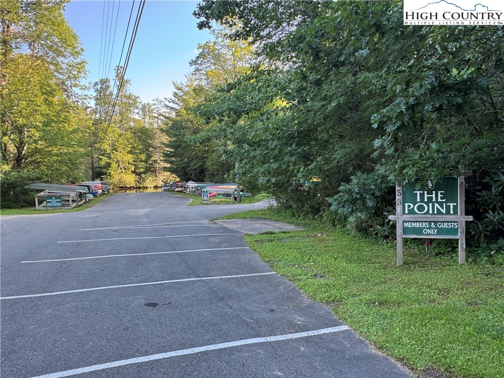 203 Black Pine Road Newland, NC 28657 - Photo 25 of 39 a view of a park with bench and trees