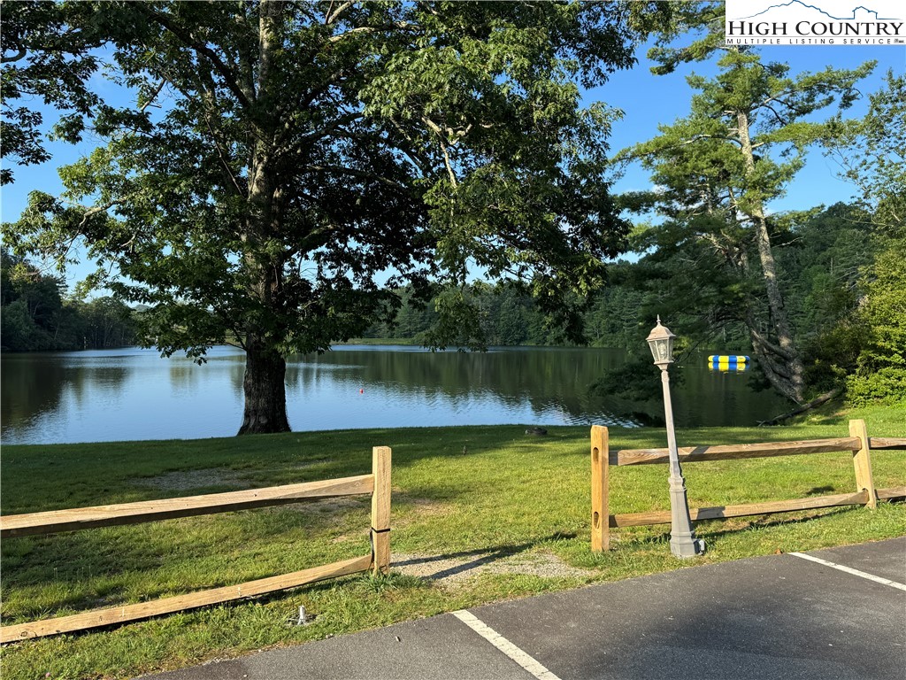 203 Black Pine Road Newland, NC 28657 - Photo 34 of 39 a view of a swimming pool with a yard