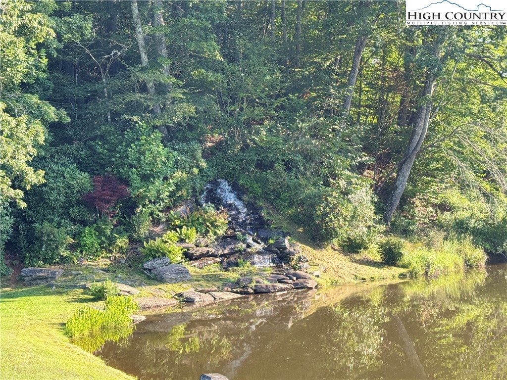 203 Black Pine Road Newland, NC 28657 - Photo 36 of 39 a view of swimming pool with a yard