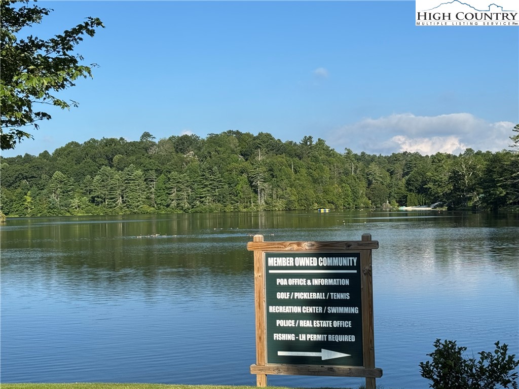 203 Black Pine Road Newland, NC 28657 - Photo 37 of 39 a view of a lake with a mountain in the background