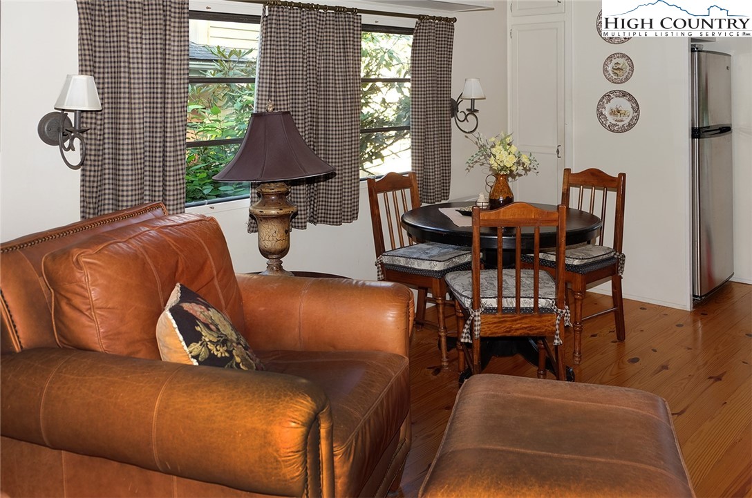 203 Black Pine Road Newland, NC 28657 - Photo 6 of 39 a living room with furniture and a window