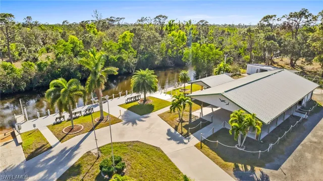 aerial view of a house with swimming pool and sitting area