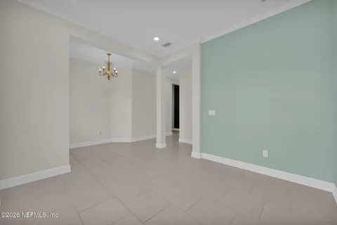 a kitchen with stainless steel appliances granite countertop white cabinets and a granite counter tops