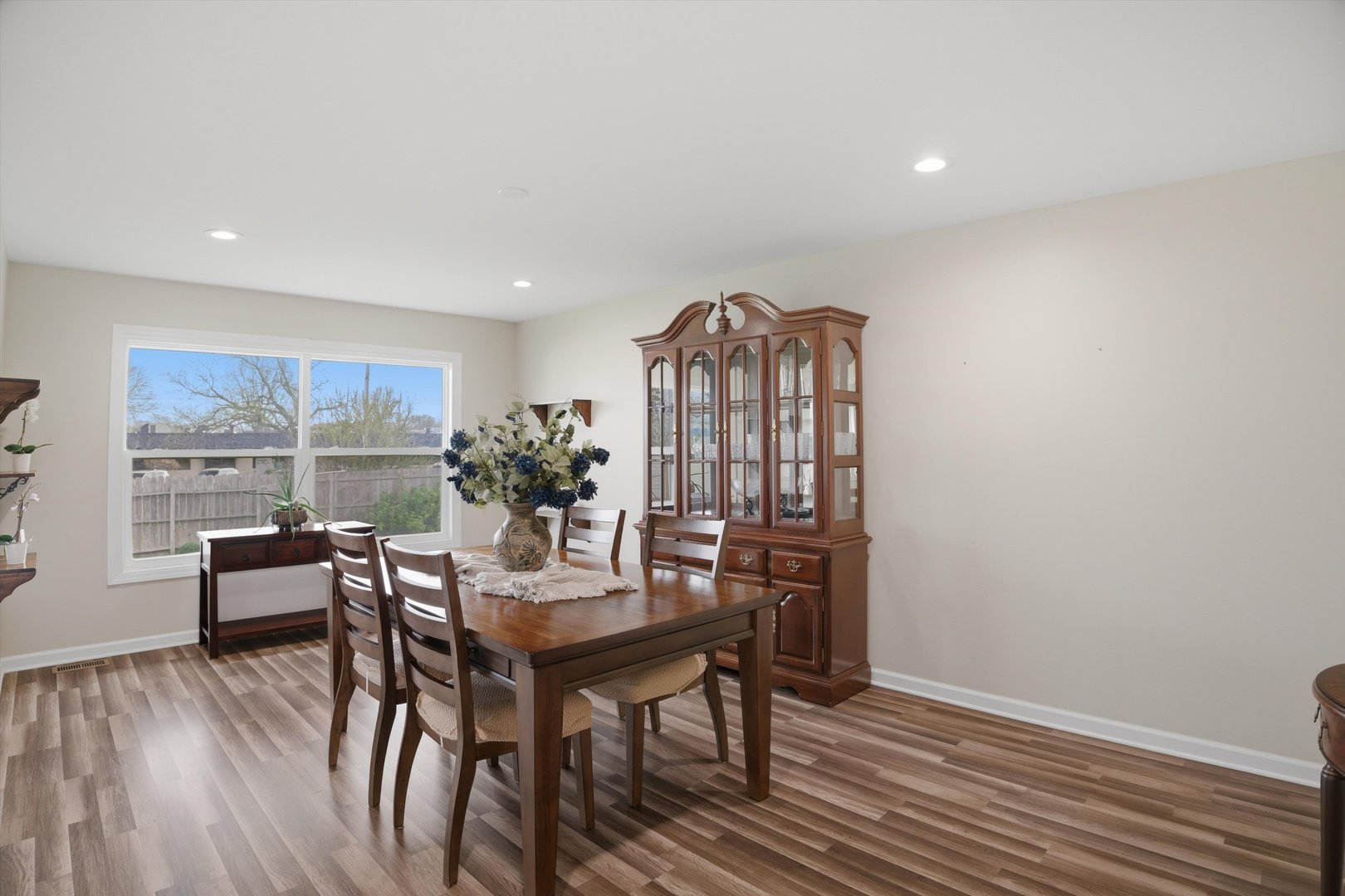25 Devonshire Circle Elgin, IL 60123 - Photo 6 of 31 a view of a dining room with furniture window and wooden floor