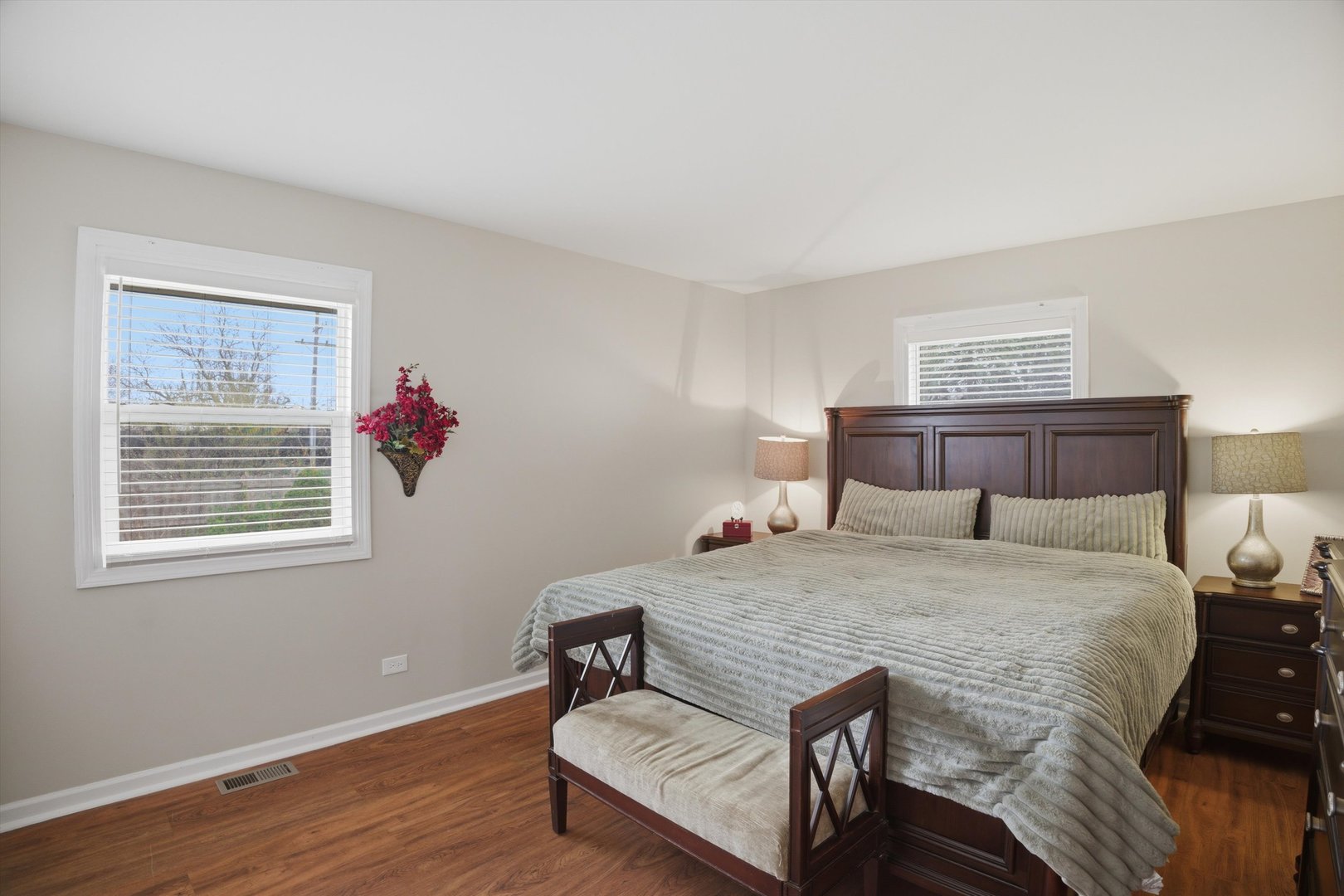 25 Devonshire Circle Elgin, IL 60123 - Photo 10 of 31 a bedroom with a bed and wooden floor