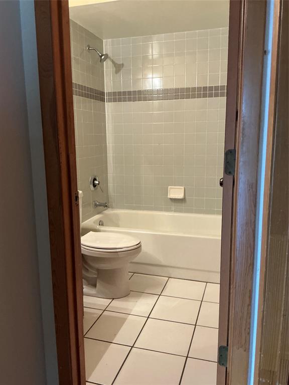 1858 Southwest Capehart Avenue Port St. Lucie, FL 34953 - Photo 11 of 11 a bathroom with a toilet and a shower