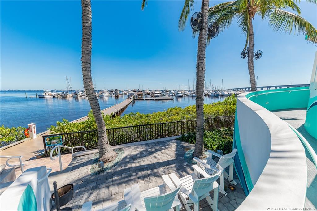 715 Northwest Flagler Avenue, Unit 202 Stuart, FL 34994 - Photo 16 of 26 a view of a terrace with sitting area