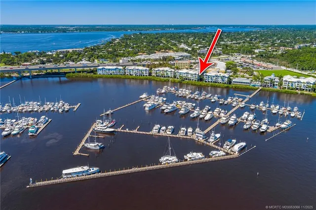 a kitchen with stainless steel appliances granite countertop a stove microwave and refrigerator