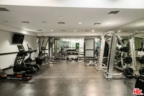 a view of a room with gym equipment