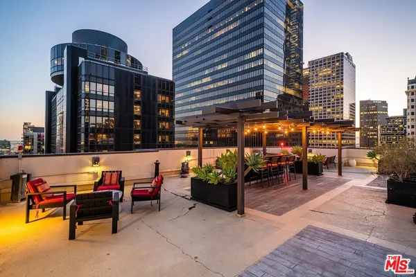 a outdoor space with patio furniture and a potted plant