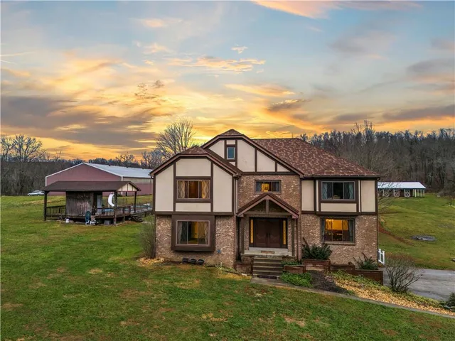 front view of a house with a yard