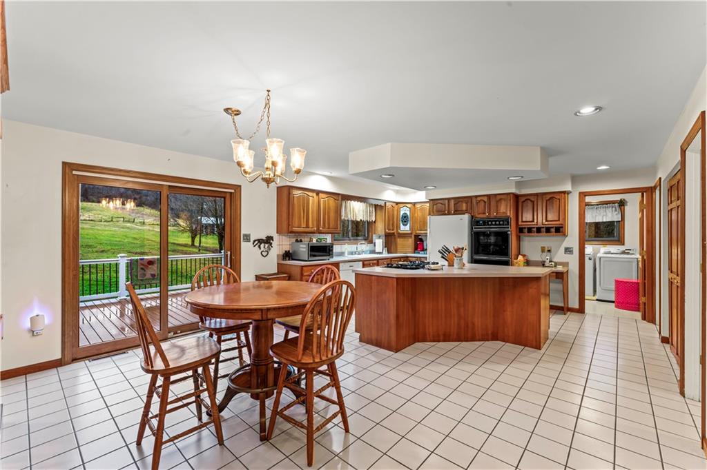 420 Vaneal Road Washington, PA 15301 - Photo 11 of 42 a view of a dining room with furniture window and outside view