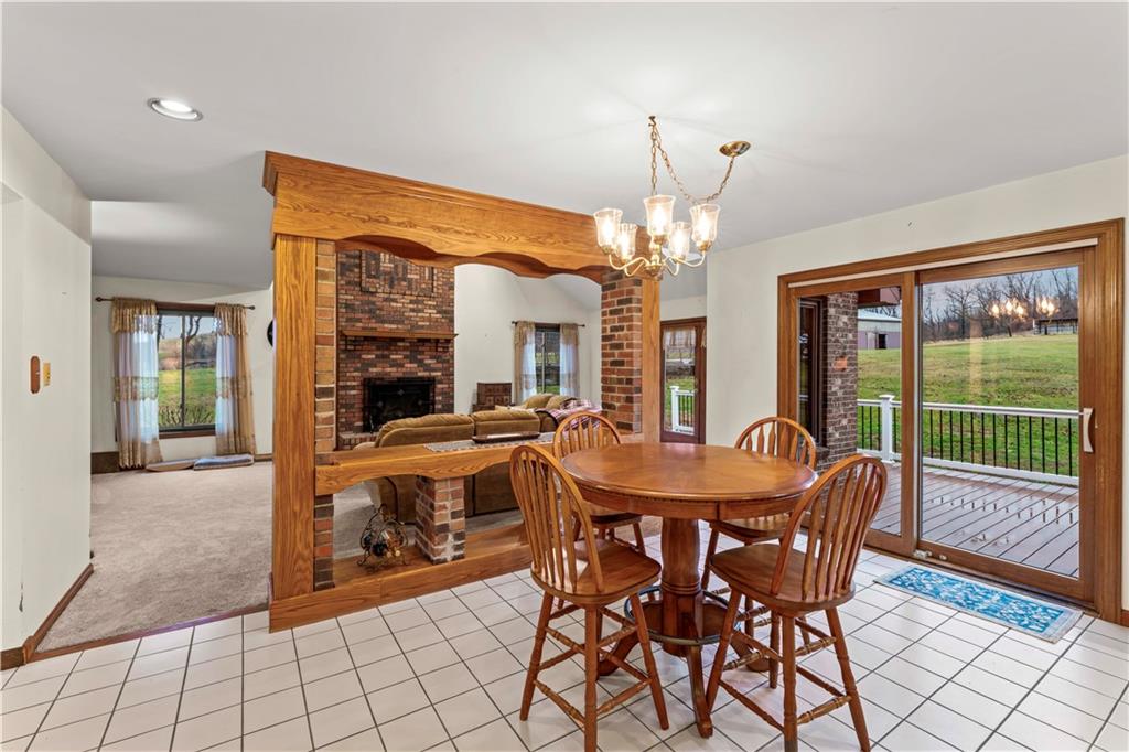 420 Vaneal Road Washington, PA 15301 - Photo 12 of 42 a dining room filled with furniture and large windows