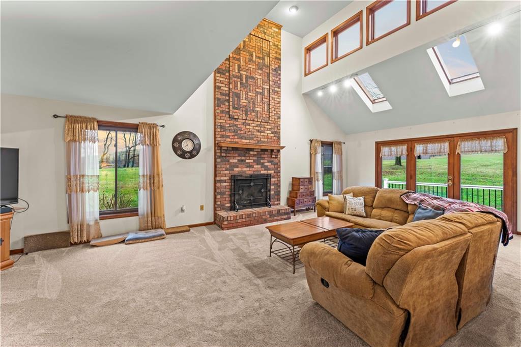 420 Vaneal Road Washington, PA 15301 - Photo 14 of 42 a living room with fireplace furniture and a large window
