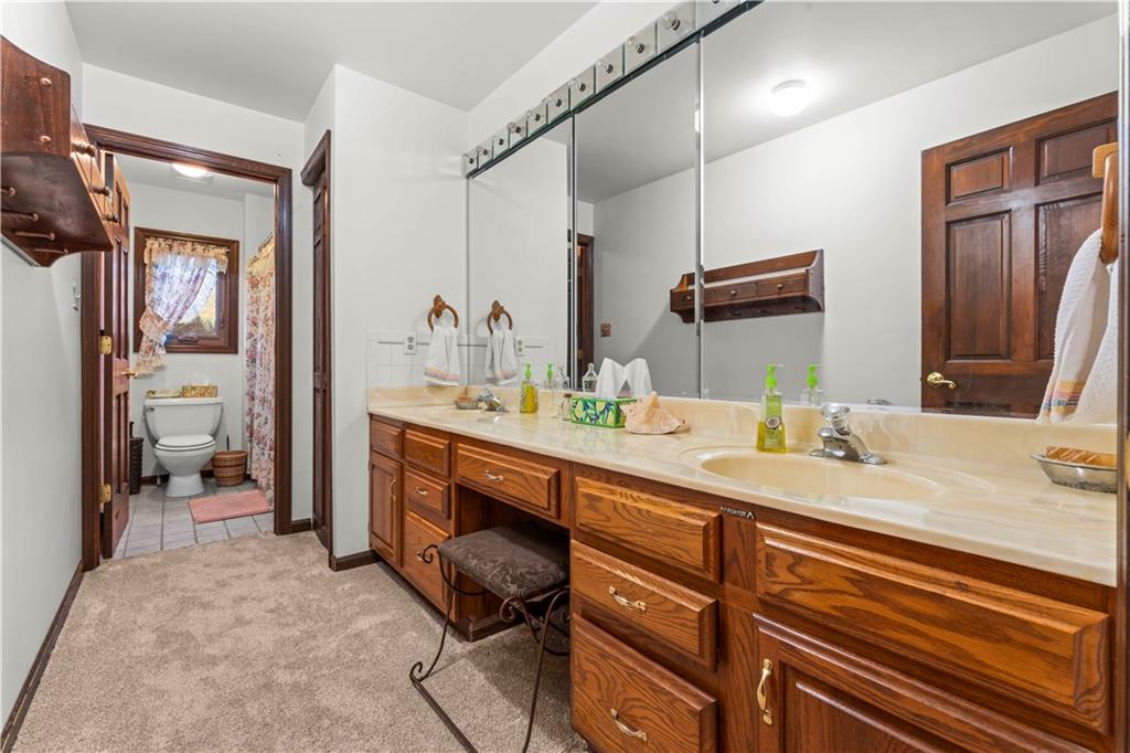 420 Vaneal Road Washington, PA 15301 - Photo 25 of 42 a spacious bathroom with a sink double vanity and a mirror