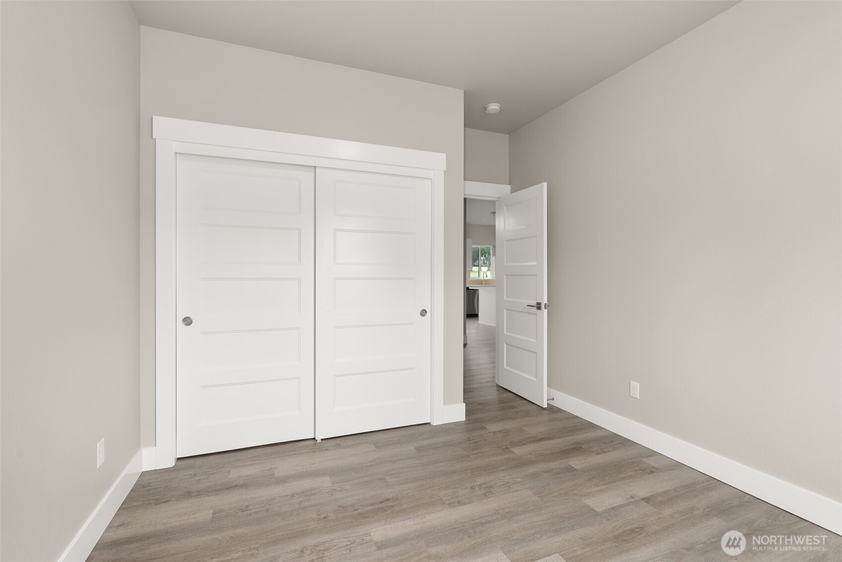 2103 Hawks Vw Lane Winlock, WA 98596 - Photo 12 of 24 an empty room with wooden floor