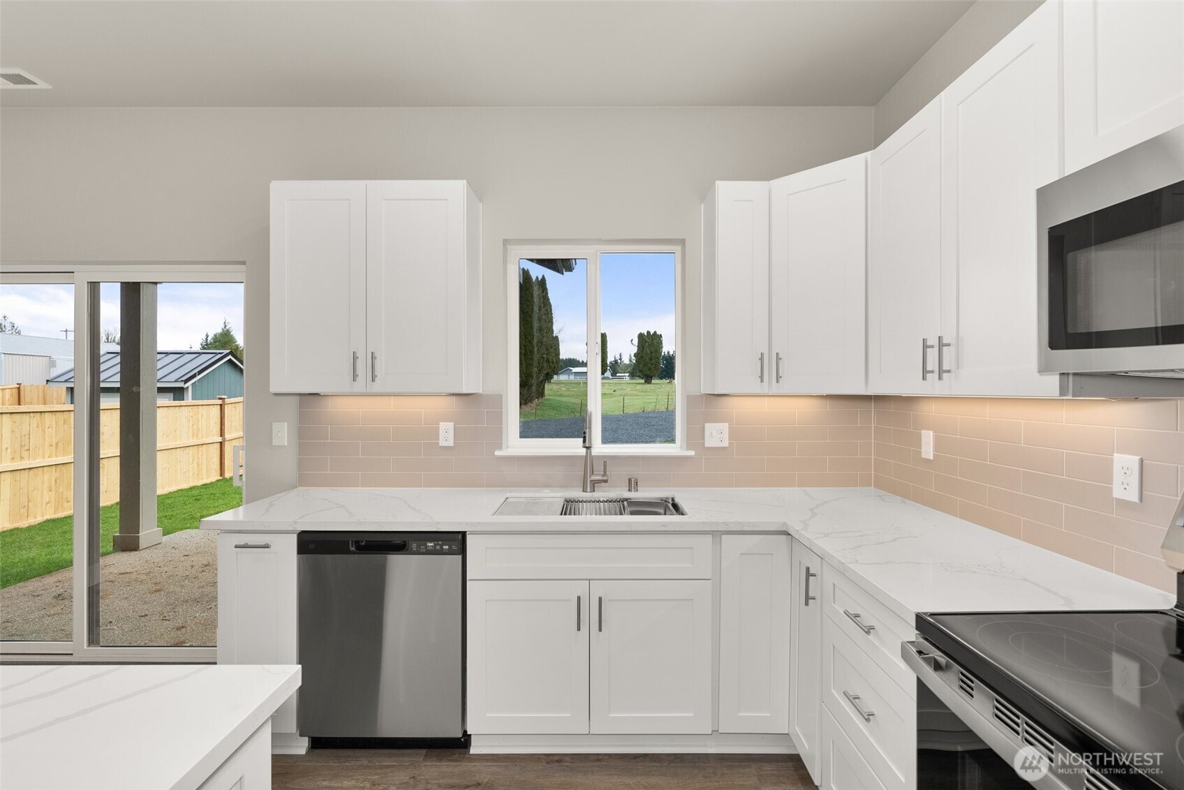 2103 Hawks Vw Lane Winlock, WA 98596 - Photo 5 of 24 a kitchen with a sink cabinets and window