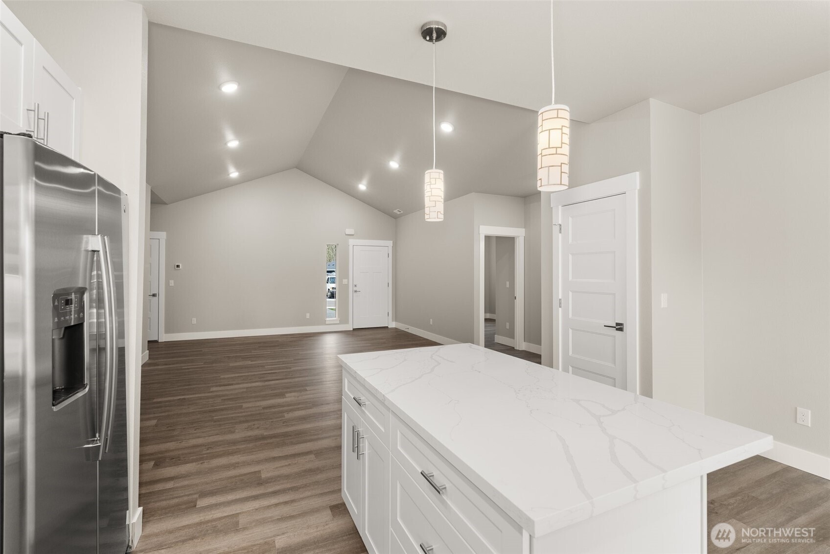 2103 Hawks Vw Lane Winlock, WA 98596 - Photo 6 of 24 a large white kitchen with a refrigerator a sink and a stove