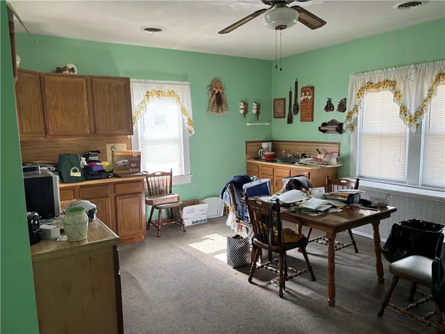 a workspace with furniture and window