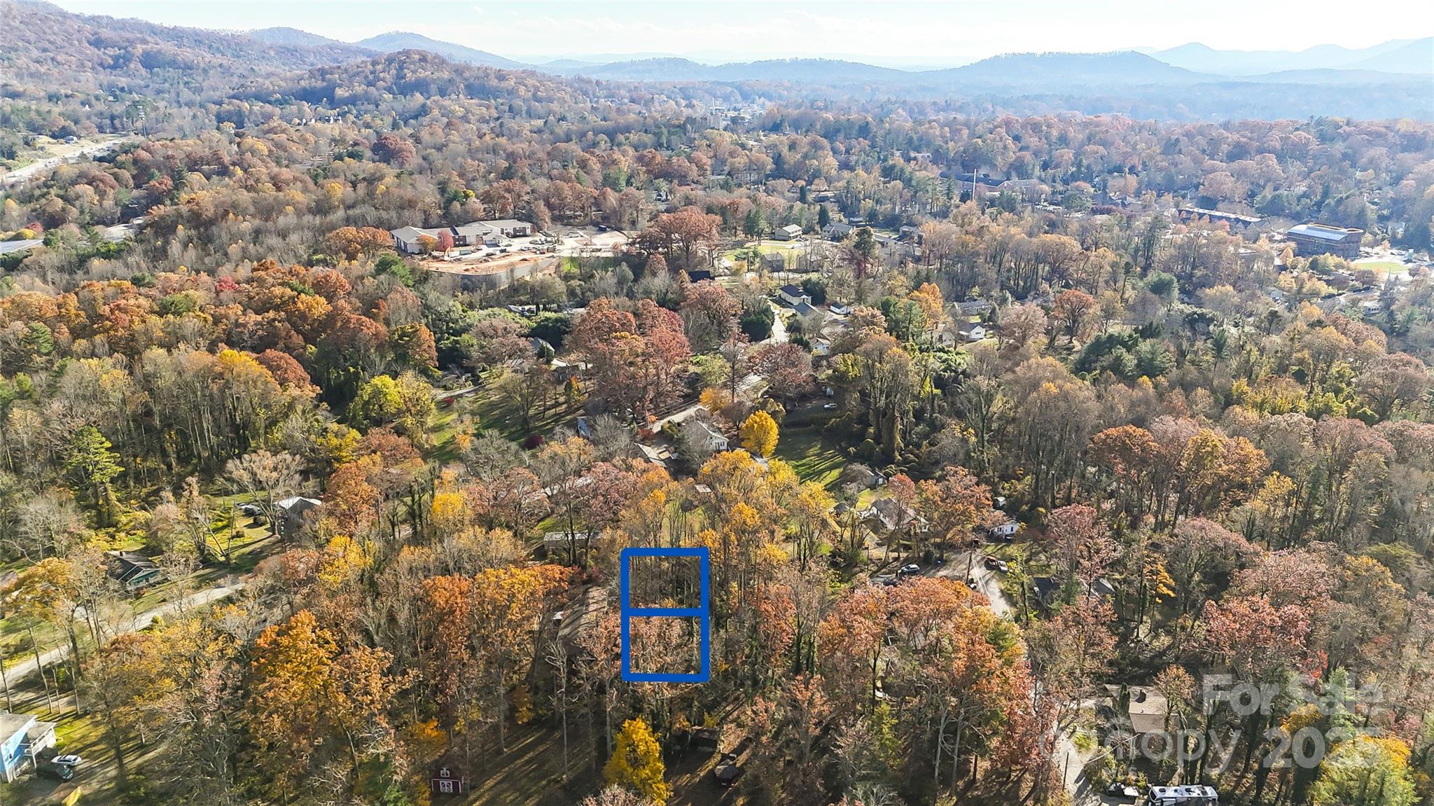 99999 Caribou Road Asheville, NC 28803 - Photo 4 of 8 an aerial view of residential houses with outdoor space