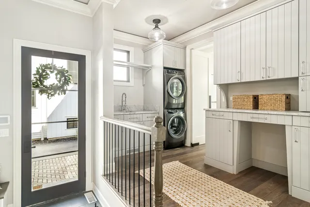a view of an entryway with wooden floor and stairs